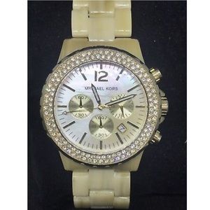 Michael Kors MK5558 women’s gold tone wrist watch
